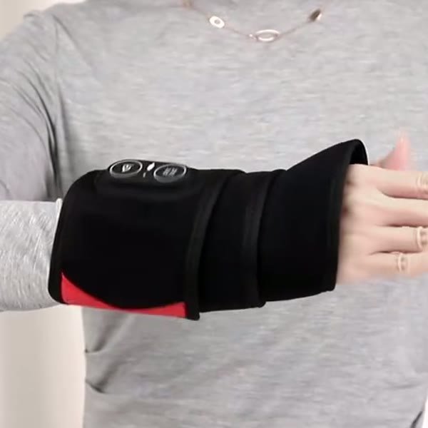 Thumb through the hole and the strap wrapped around the wrist